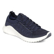 Navy blue athletic sneaker with breathable mesh and synthetic upper, white midsole, lace-up front, and a low-profile .8-inch heel designed for support and comfort.