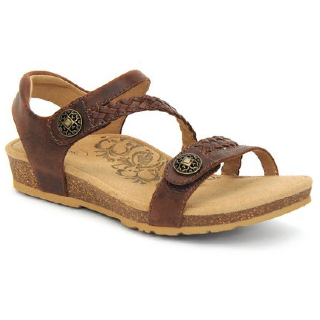 Brown leather sandal in a walnut tone with two wide adjustable hook-and-loop straps across the foot, padded heel strap, contoured footbed with built-in arch support, and low cork-rubber sole designed for comfort and pain relief.