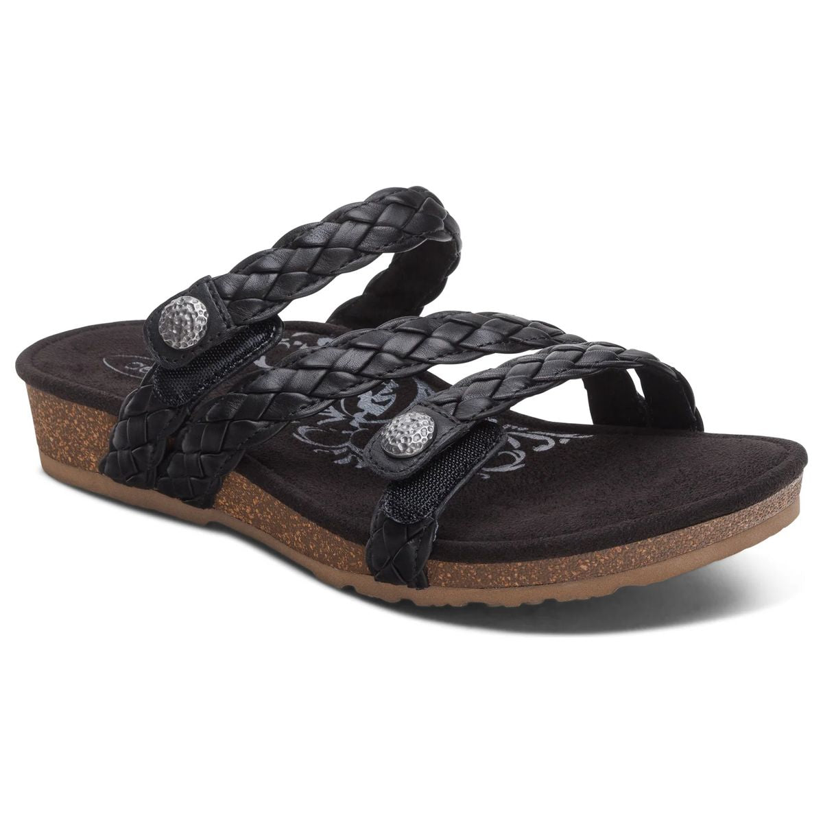 Women's Aetrex Josie black leather braided slide sandal with an adjustable top strap and visible ultra-light cork midsole.