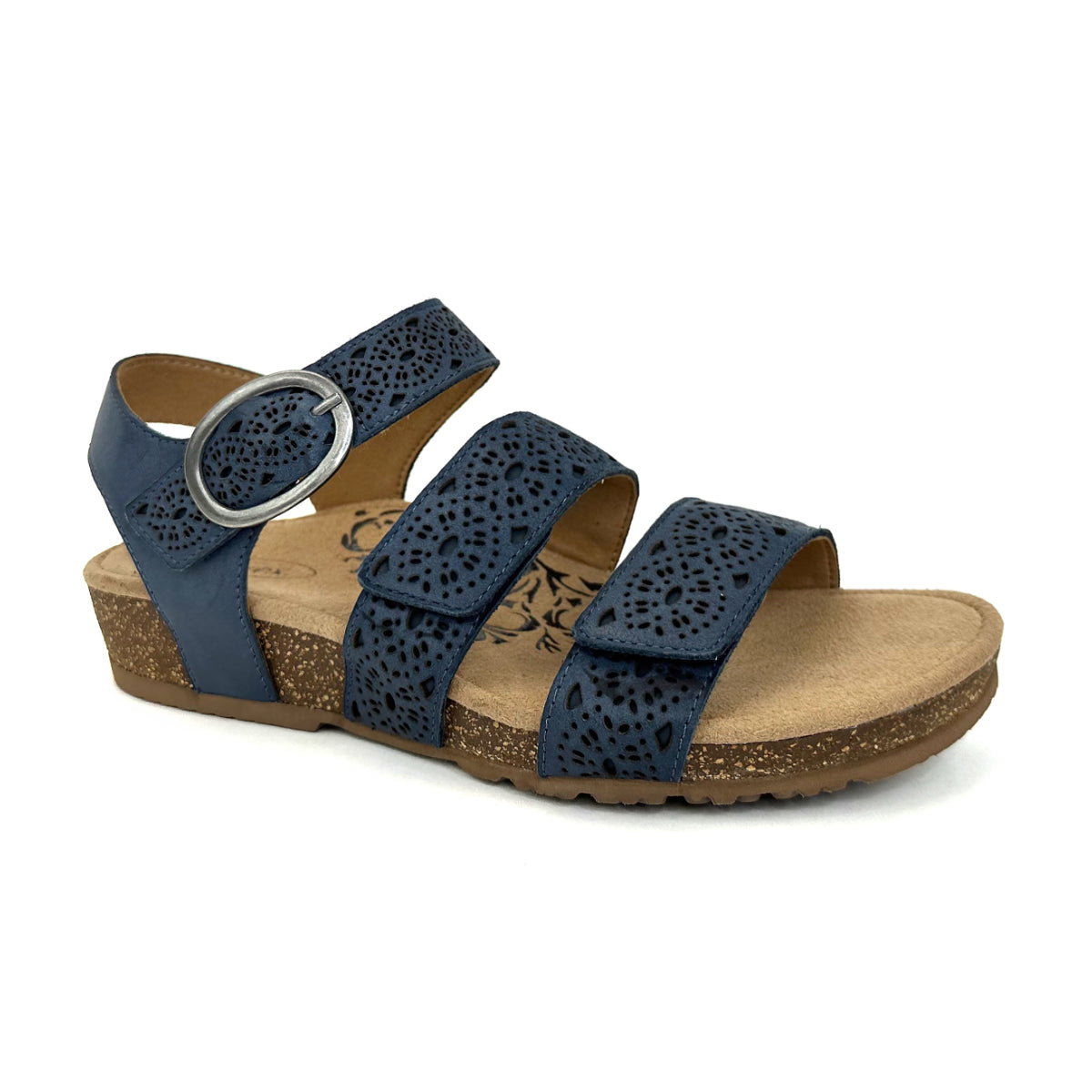 Navy leather sandal with cutout detailing and two adjustable hook-and-loop straps, contoured footbed with arch and forefoot support, and a low cork-rubber outsole designed for comfort and stability. Style #SC571