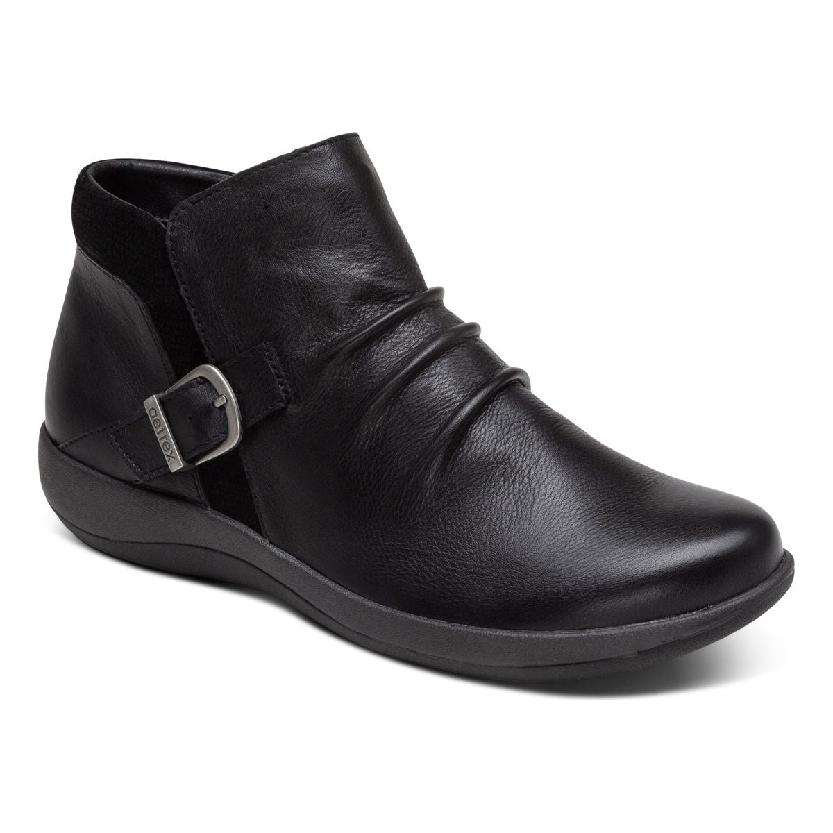 Black leather and nubuck ankle boot with adjustable side buckle, functional side zipper, rounded toe, removable insole, and a low 1 5/16" wedge heel with lightweight rubber sole. Style #DM700WW