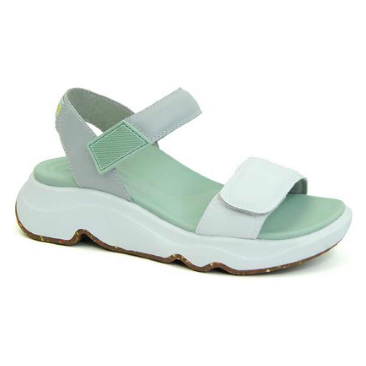 Aetrex Whit sport sandal in mint green with three hook and loop straps, contoured footbed, and lightweight rubber sole. Open-toe design with antimicrobial faux leather upper and sporty silhouette.