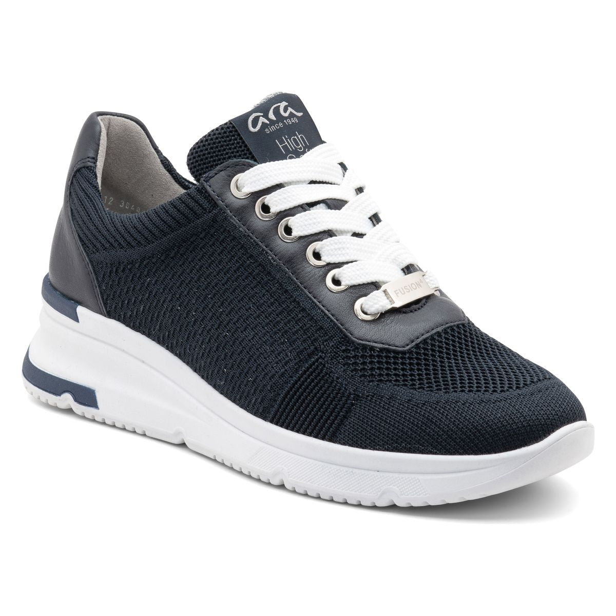Women’s lace‑up sneaker in black stretch textile with rounded toe, cushioned footbed, and lightweight rubber sole. Features a flexible, supportive design for comfortable everyday wear. Style #38407-02