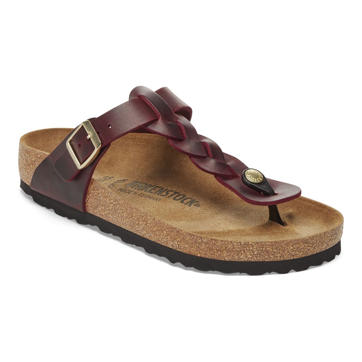 A red Birkenstock Gizeh sandal with braided oiled leather upper and an anatomically shaped cork-latex footbed. Colour is zinfandel.