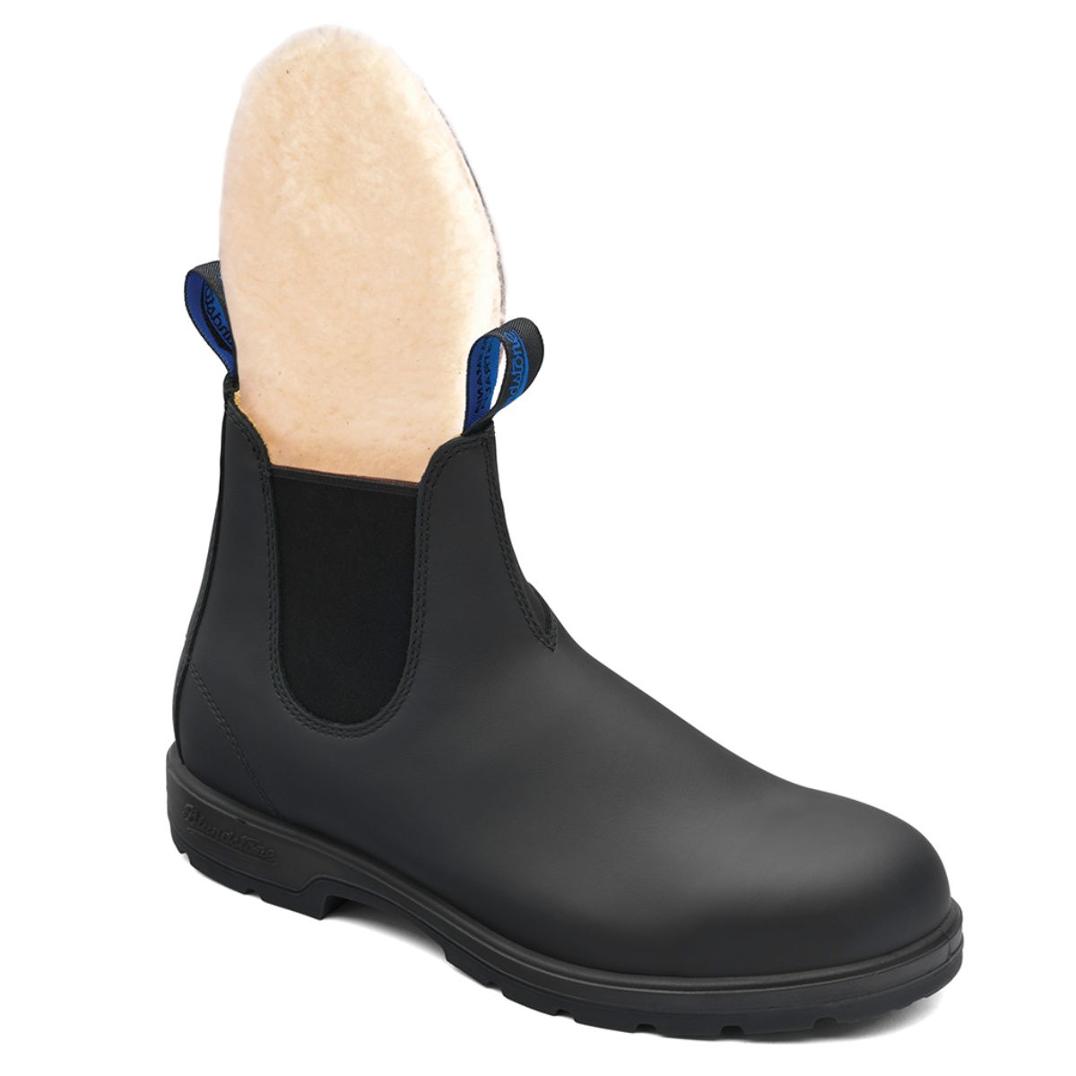 Blundstone 566 Winter Waterproof Unisex Boot in black leather with elastic panels, removable sheepskin footbed, Thinsulate insulation, XRD™ heel pad, and polyurethane midsole for warm, dry, and comfortable winter wear. Style #566