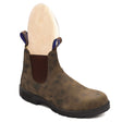 Blundstone 584 Winter Waterproof Unisex Boot in rustic brown leather with elastic panels and latexed seams, Thinsulate insulation, removable sheepskin footbed, XRD™ heel pad, and polyurethane midsole for warm, dry, and comfortable winter wear. Style #584