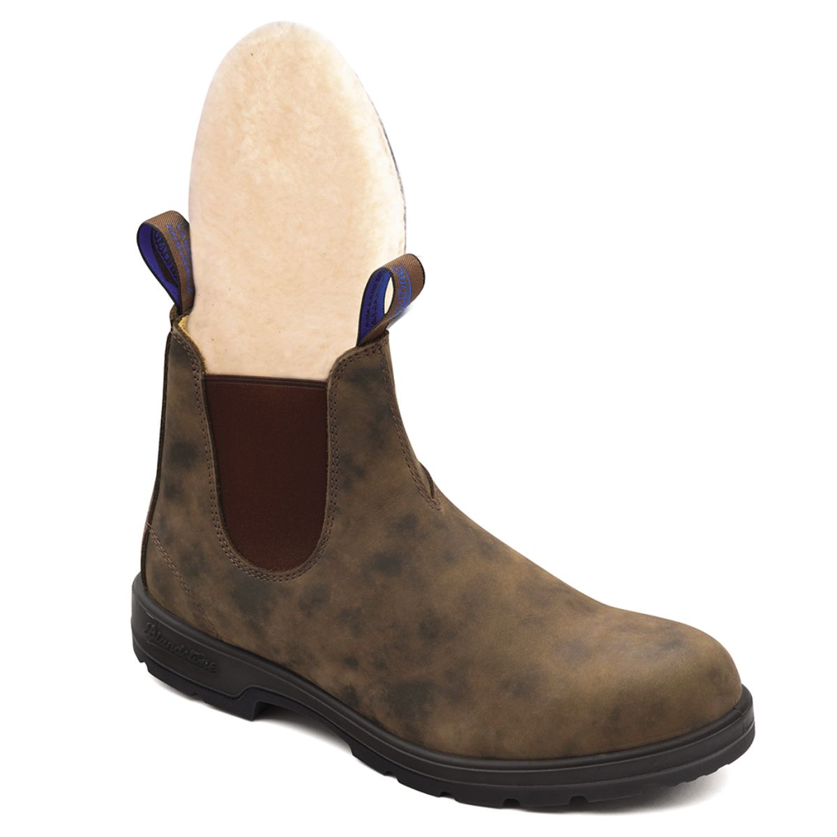 Blundstone 584 Winter Waterproof Unisex Boot in rustic brown leather with elastic panels and latexed seams, Thinsulate insulation, removable sheepskin footbed, XRD™ heel pad, and polyurethane midsole for warm, dry, and comfortable winter wear. Style #584