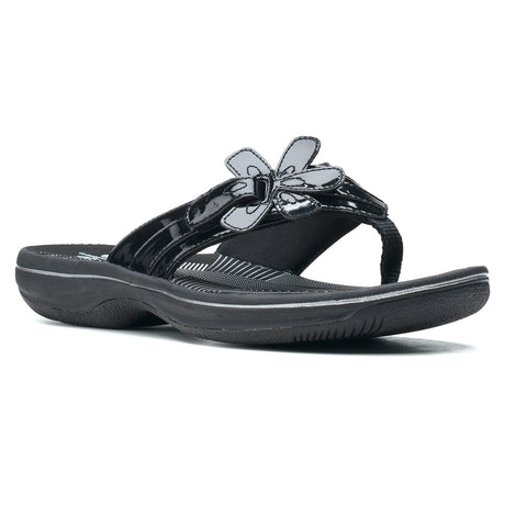 Clarks Brinkley Flora women’s thong sandal in black patent with floral strap detail. Style #26159852