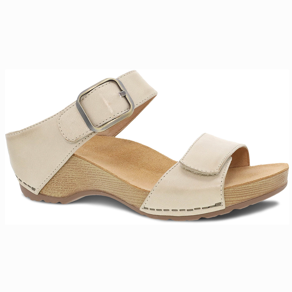 Dansko Tanya Burnished Women's Leather Sandals, burnished leather slides with adjustable straps, all-day comfort, and a lightweight, cushioned footbed. Style #1711441600