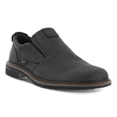 Men’s dark brown nubuck waterproof slip-on shoe with low heel, stitched leather welt, and smooth rounded toe for a sleek, smart-casual appearance.
Style #51018401