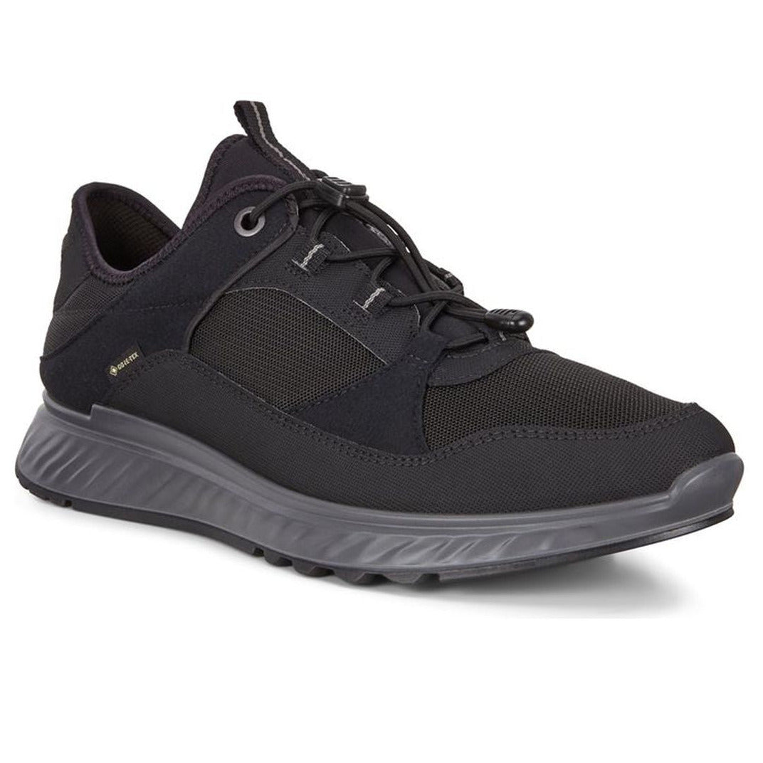 All-black men's athletic sneaker with GORE-TEX logo, bungee laces, and a thick grey textured midsole. Style #8353340001