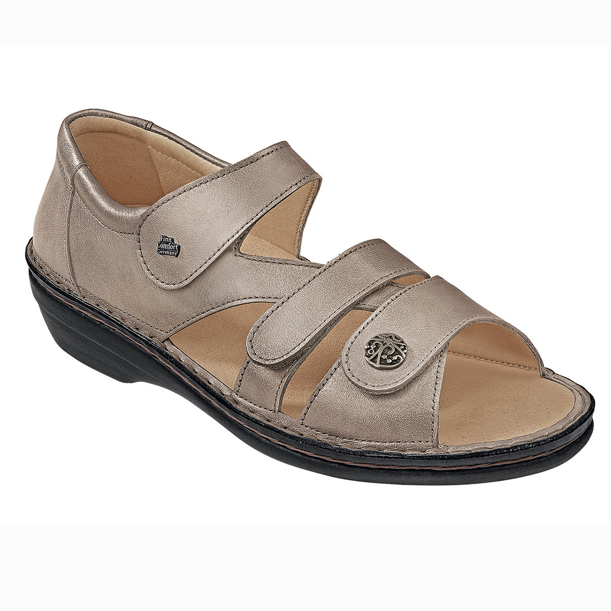 Taupe leather sandal with three Velcro straps, decorative button accent, suede-lined soft footbed, and low heel for breathable, supportive all-day comfort. Style #8258585081