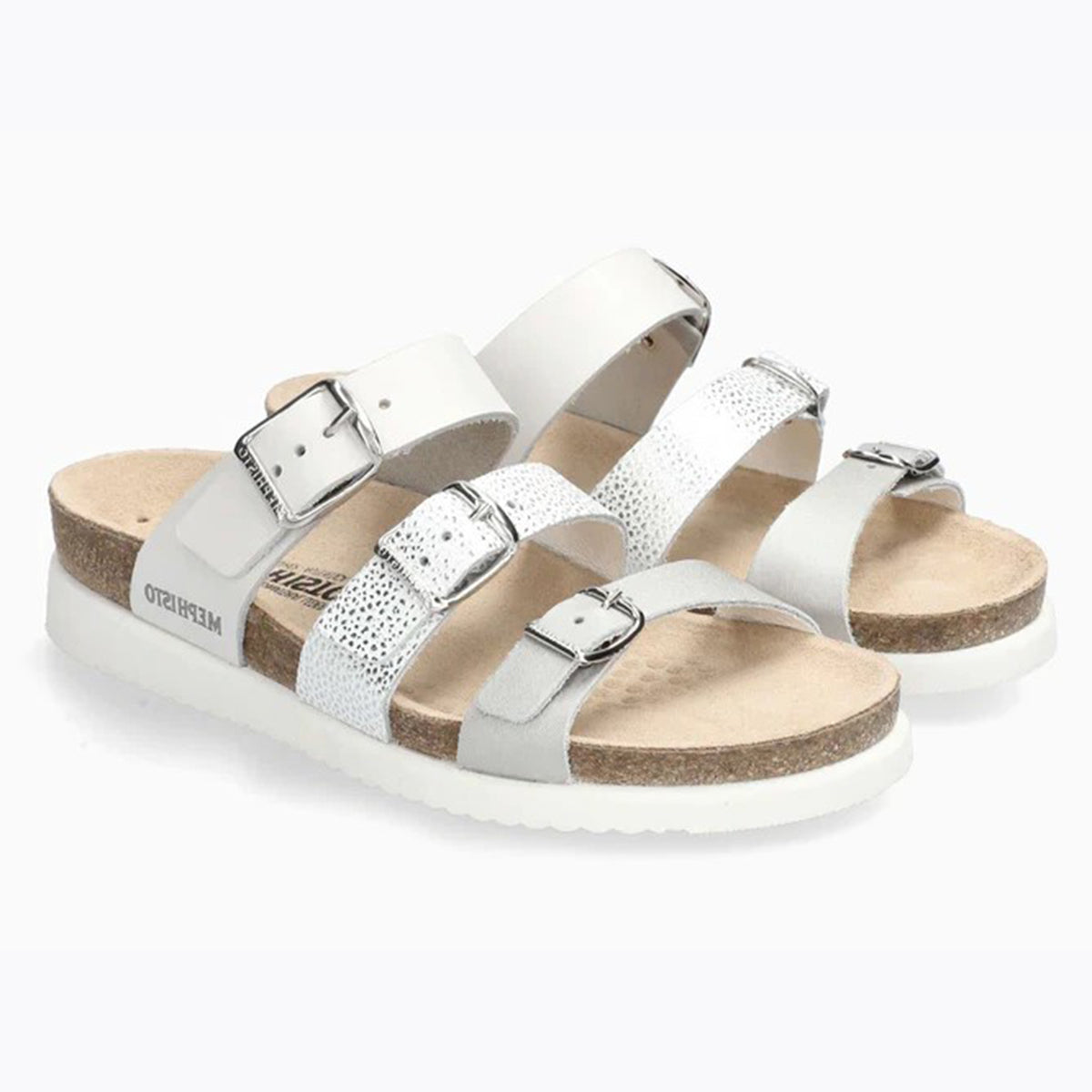 Mephisto Hyacinta Women's Sandals in Silver - style 27668/7006. A pair of Mephisto Hyacinta sandals with silver and white leather straps and silver buckles. Comfortable, All-day wear, soft footbed, leather, classic look, walking shoe, easy on and off, sandal, clog, heel, Mephisto Hyacinta sandals, silver leather sandals, women’s flat sandals, SOFT-AIR comfort shoes.