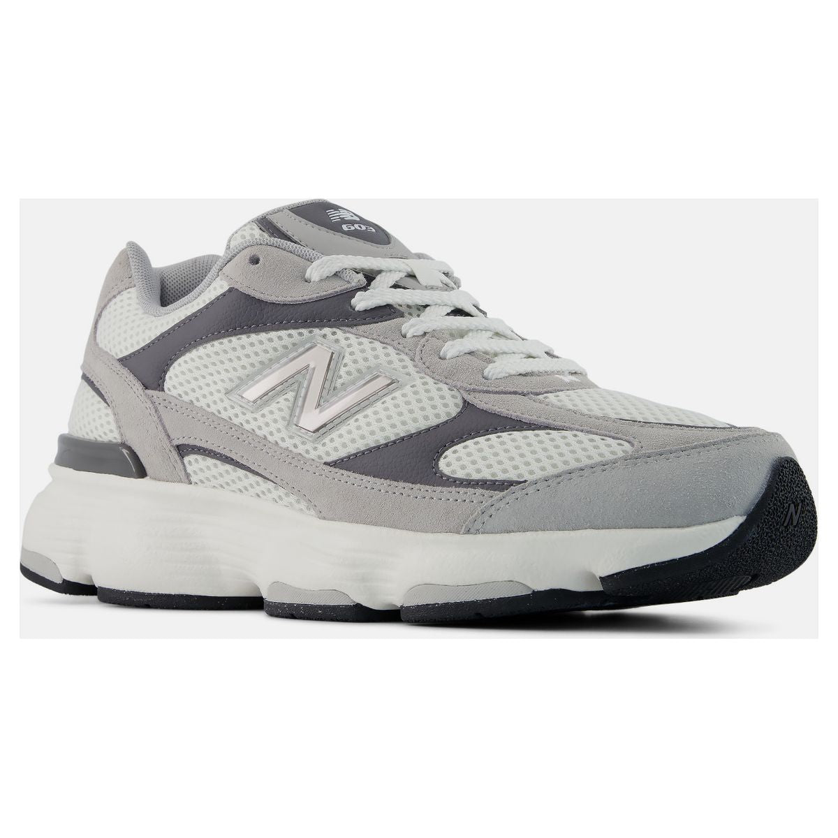 Men's grey and white mesh low-top walking sneaker with a silver side logo, white laces, and a thick white sole. Style #M6032OD.