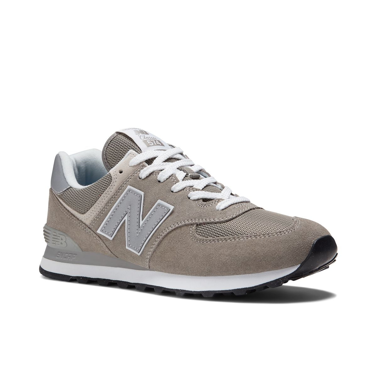 New Balance Men’s 574EVG casual sneaker in Grey/White suede and mesh, featuring ENCAP midsole cushioning and classic retro silhouette – available at Walking on a Cloud Canada. Style #ML574EVG