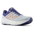 Women's New Balance Fresh Foam X 860v14 stability runner in light blue mesh with white sole, purple trim, and peach 'N' logo. Style # W86014E.