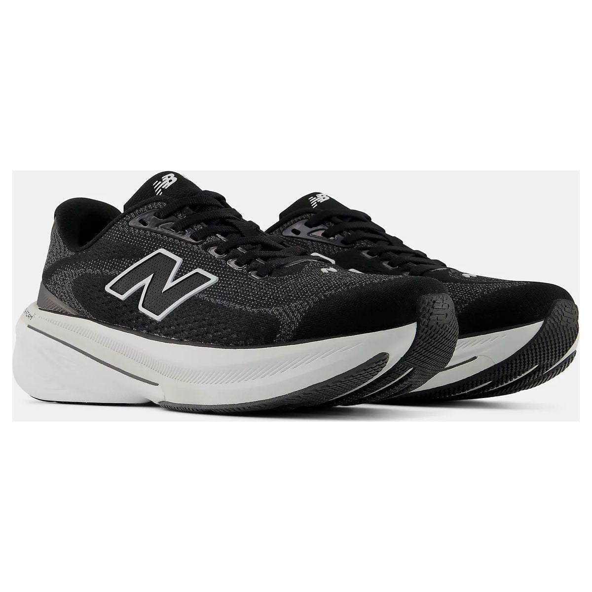Women's black and white lace-up running shoes with a large N logo and a thick cushioned Fresh Foam X midsole. Style #W8604NE