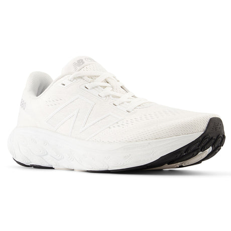 New Balance Women’s 880v14 Fresh Foam running shoe in white with engineered mesh upper, cushioned midsole, and durable rubber outsole – available at Walking on a Cloud Canada. Style #W880W14