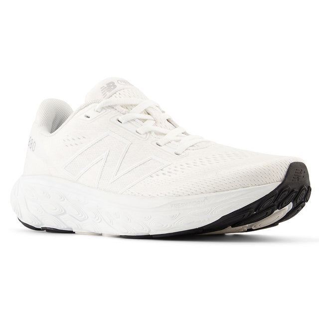 New Balance Women’s 880v14 Fresh Foam running shoe in white with engineered mesh upper, cushioned midsole, and durable rubber outsole – available at Walking on a Cloud Canada. Style #W880W14