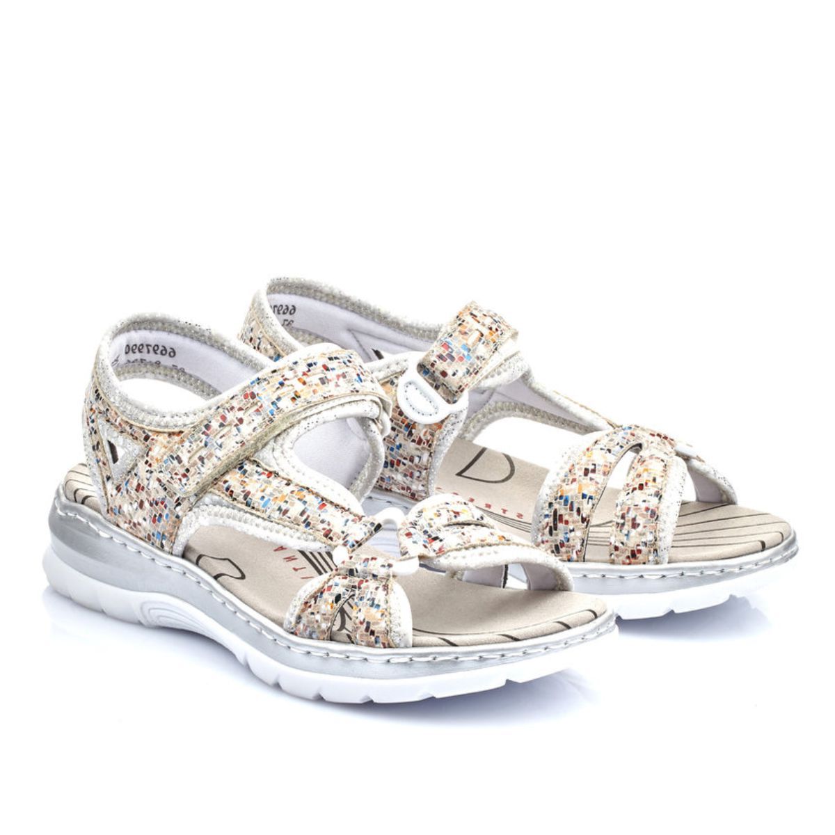 Rieker women's sandal in multicolour pebble pattern with Velcro strap, cushioned Antistress footbed, and flexible low heel rubber sole. Style #66979-90