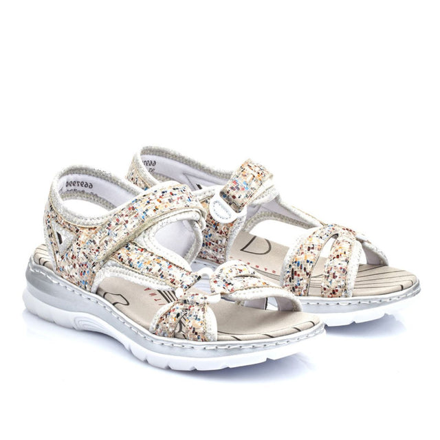 Rieker women's sandal in multicolour pebble pattern with Velcro strap, cushioned Antistress footbed, and flexible low heel rubber sole. Style #66979-90