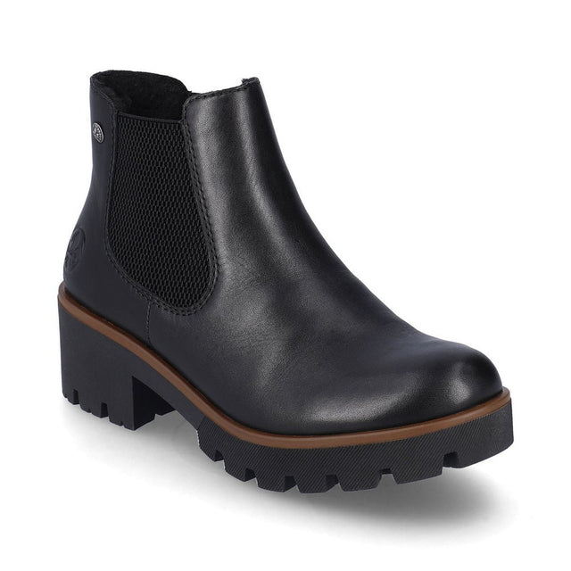 Rieker 79265 Women’s Black Chelsea Boots featuring smooth synthetic uppers, elastic side panels, short fur lining, and a 51mm block heel for stylish comfort.