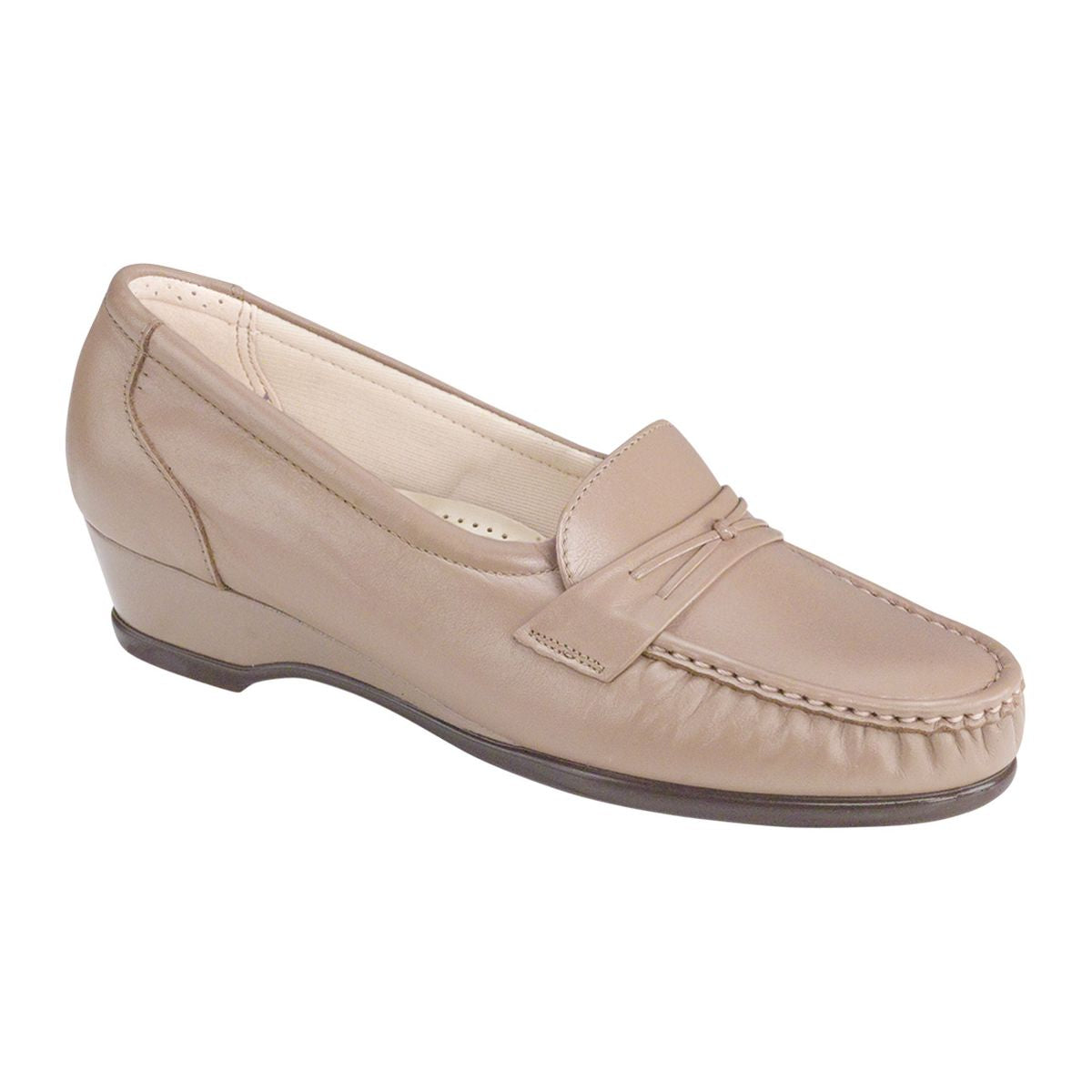 Black leather slip-on loafer with decorative saddle detail, cushioned removable footbed, hidden elastic panel, and low wedge heel for everyday comfort. Style #0128-015