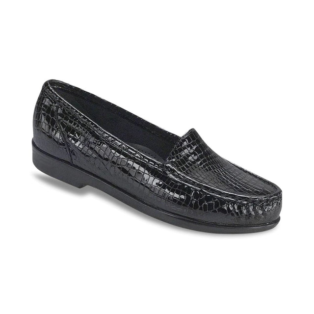 SAS Simplify women’s slip-on loafer in Black Crocodile textured leather with crocodile pattern, padded lining, removable cushioned footbed, and 1-inch heel for elegant everyday wear. Style #1556-181