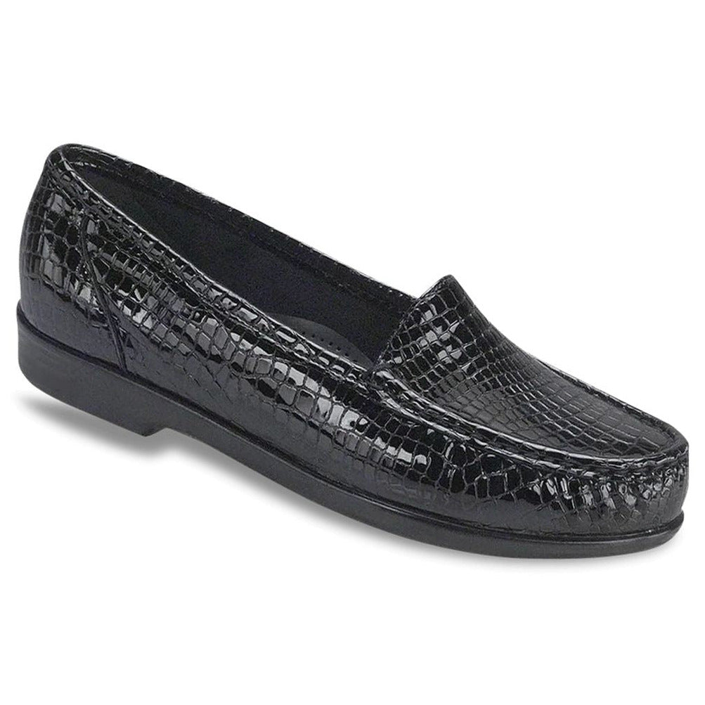 SAS Simplify women’s slip-on loafer in Black Crocodile textured leather with crocodile pattern, padded lining, removable cushioned footbed, and 1-inch heel for elegant everyday wear. Style #1556-181