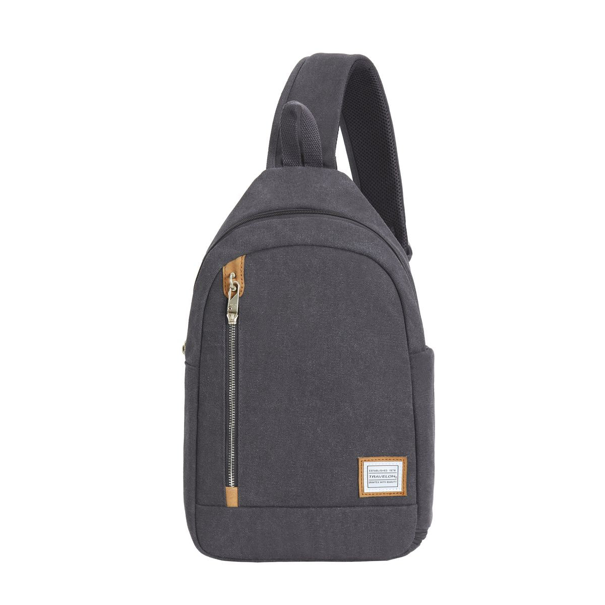Pewter grey canvas anti-theft sling bag with brown trim, vertical zipper, and adjustable mesh strap. Style #33604-540
