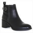 Black women’s midheight walking boot with waterproof vegan leather, side zipper, block heel, and stylish buckle detail—perfect for cool, wet seasons. Style #T24617-B20