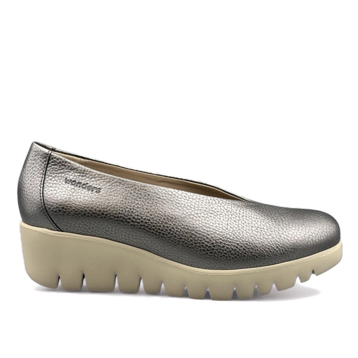 Silver metallic leather Wonders wedge slip-on shoe with a textured finish and a cream ripple-textured sole. Product code: C33100-124.
