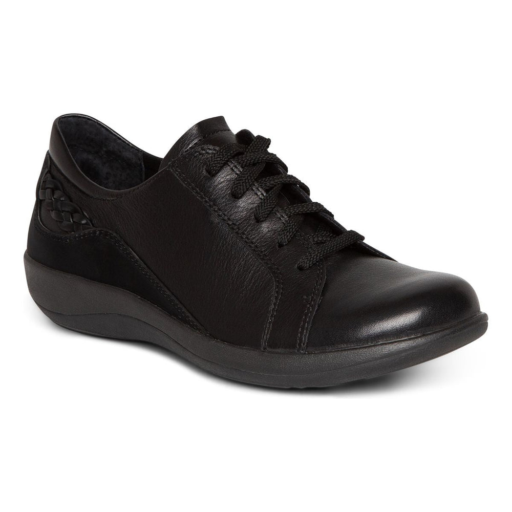 Black genuine leather Aetrex Dana lace-up shoe with clean design, sturdy rubber sole, adjustable laces, and subtle 1.3-inch heel, designed for orthotic comfort and foot support.