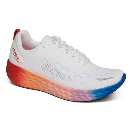 Aetrex Danika White Ombre sneaker with breathable mesh upper fading from white to soft grey, lace-up design, cushioned collar, and supportive rubber outsole.