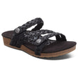 Women's Aetrex Josie black leather braided slide sandal with an adjustable top strap and visible ultra-light cork midsole.