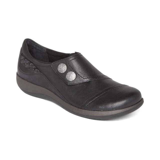 Black leather shoe with a single wide hook-and-loop monk strap across the instep, padded heel collar, contoured memory foam footbed with built-in arch support, and a low rubber outsole for everyday comfort and support. Style #DM500WW