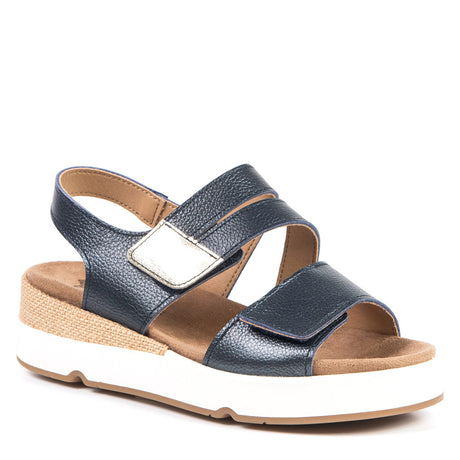 Women’s navy blue leather sandal with two adjustable straps, a jute-wrapped wedge, and a thick white sole. Style #AP-11427