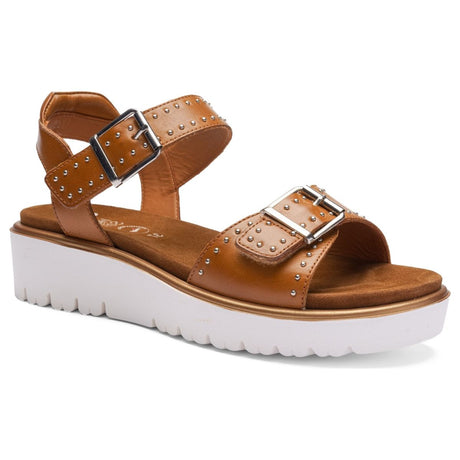 Ara cognac leather wedge sandal with silver stud accents, double adjustable buckle straps, and white platform sole. Style #33517-09
