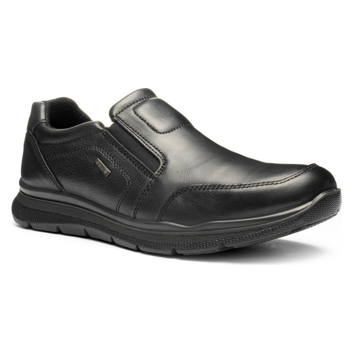 Men's black leather slip-on shoe with elastic side gores, moc toe stitching, and a textured black rubber sole. Style #24606-01