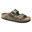 Black & gold shiny python patterned Birkenstock Arizona slide sandal with two gold buckles and a natural cork footbed. Style #1019372.