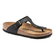 Black thong sandal with adjustable buckle, contoured cork footbed, and EVA sole. Style #43691