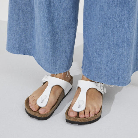 Birkenstock Gizeh sandal in white patent leather with cork footbed and adjustable buckle