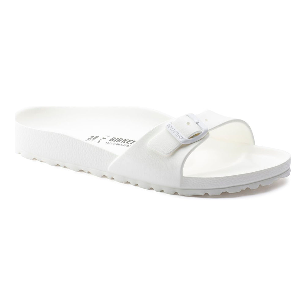 All-white molded EVA one-strap slide sandal with an adjustable matching white buckle. Style #128183.