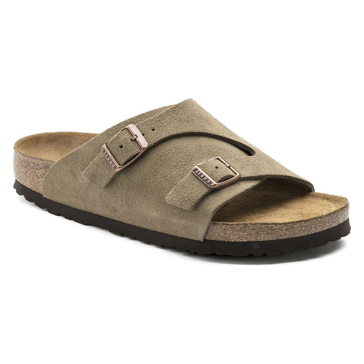 Birkenstock Zürich Soft Footbed slide in Taupe suede with two rose gold adjustable buckles and a natural cork sole. Style # 1009532