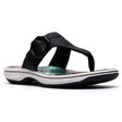 Black thong sandal with a decorative hexagonal buckle, patterned footbed, and a white sporty sole. Style #26186787