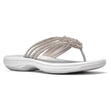 Women's silver thong sandal with rhinestone-embellished straps and a white cushioned sole. Style #26187563