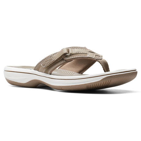 Women’s taupe thong sandal with an adjustable hook-and-loop strap, white midsole, and cushioned footbed. Style #26125507