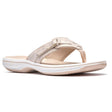 Clarks Breeze Sea gold women's thong sandal with adjustable strap, cushioned white sole, and metallic finish. Style #26186813