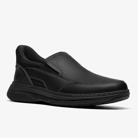 Clarks black leather slip-on shoe with contrast stitching, elastic panels, and a chunky sole, style #26184711