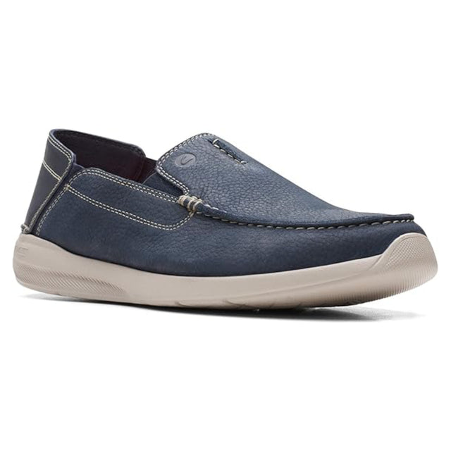 Blue slip-on shoe with white sole on a white background. Clarks Gorwin Step in Navy Nubuck. 
